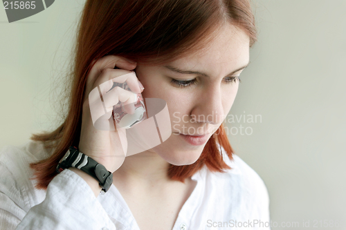 Image of Redhead girl on the phone