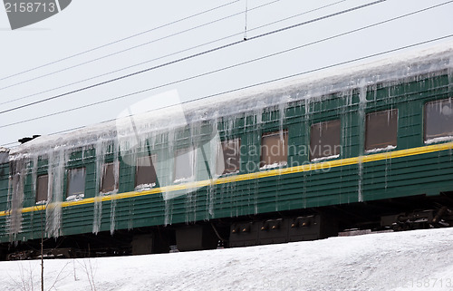 Image of Passenger train covered with ice
