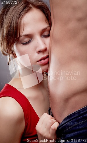 Image of Muscular man and a beautiful girl