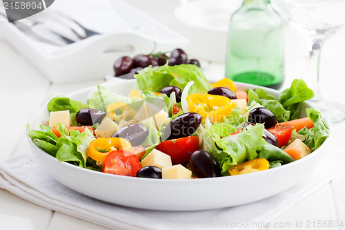 Image of Greek salad with cheese and olives