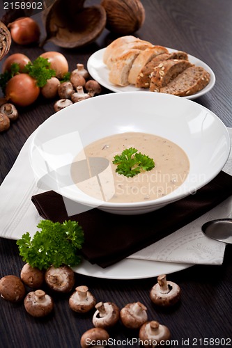 Image of fresh chmapignon cream soup with parsley