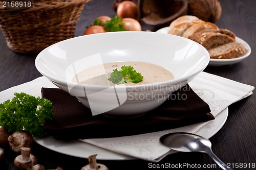 Image of fresh chmapignon cream soup with parsley