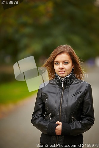 Image of Beautiful girl on autumn nature