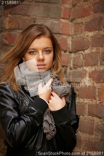 Image of Beautiful girl in autumn coat