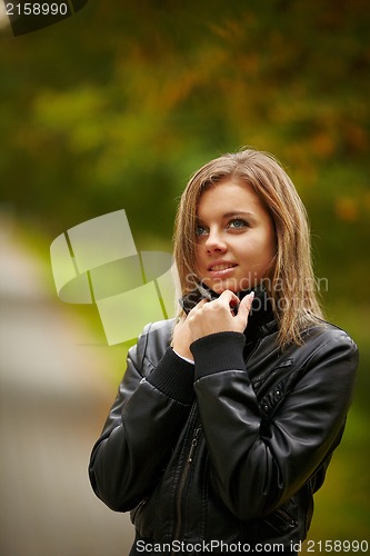 Image of Beautiful girl on autumn nature