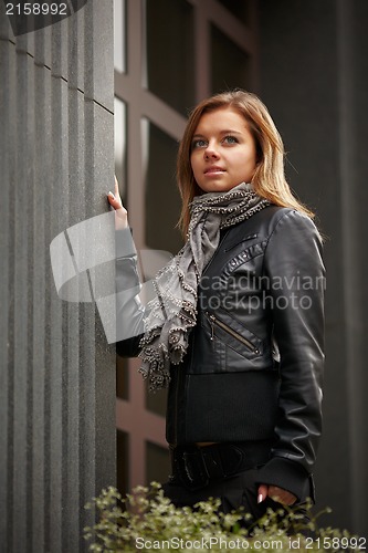 Image of Beautiful girl in autumn coat