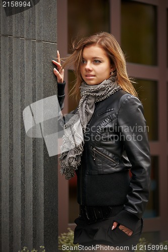 Image of Beautiful girl in autumn coat