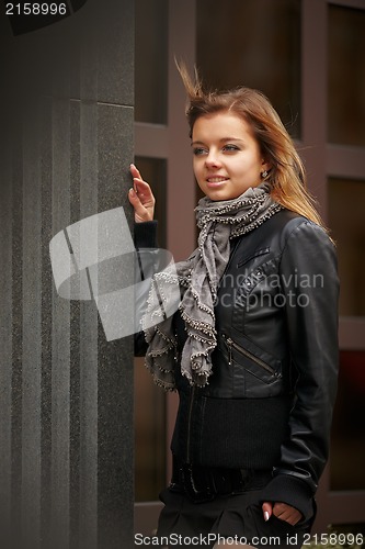 Image of Beautiful girl in autumn coat