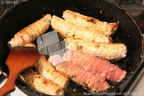 Image of Process of cooking of chops on the pan