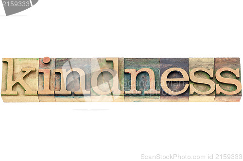 Image of kindness word in wood type