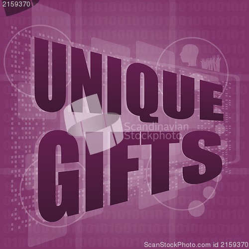 Image of unique gifts text on digital touch screen - holiday concept