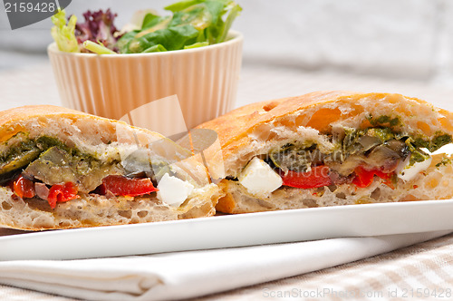 Image of ciabatta panini sandwichwith vegetable and feta