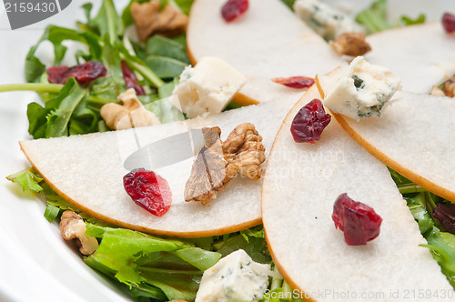 Image of Fresh pears arugula gorgonzola cheese salad
