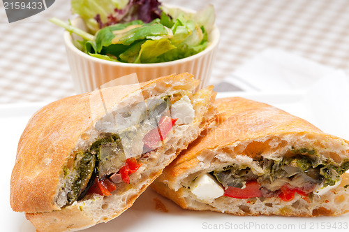 Image of ciabatta panini sandwichwith vegetable and feta