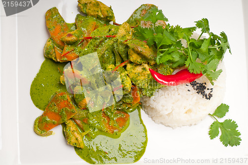 Image of chicken with green curry vegetables and rice