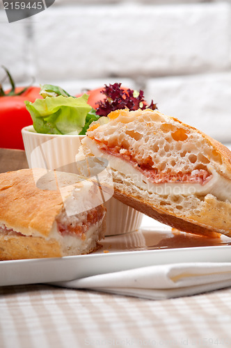 Image of ciabatta panini sandwich with parma ham and tomato