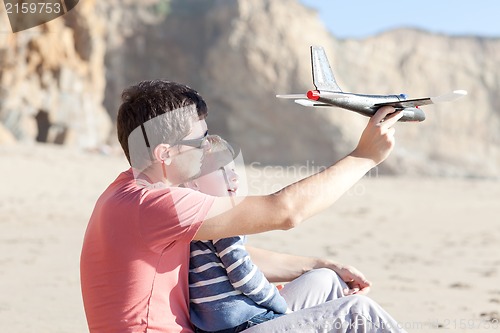 Image of playing with a toy plane