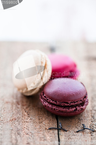 Image of Macaroons on wooden table