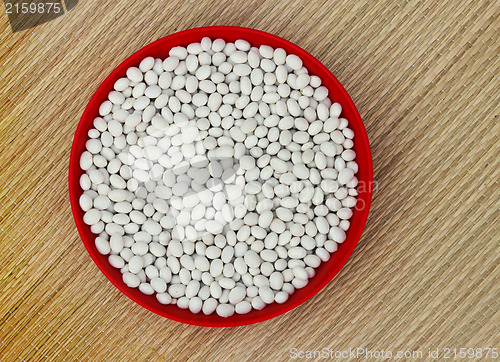 Image of Red beans in a plastic bowl