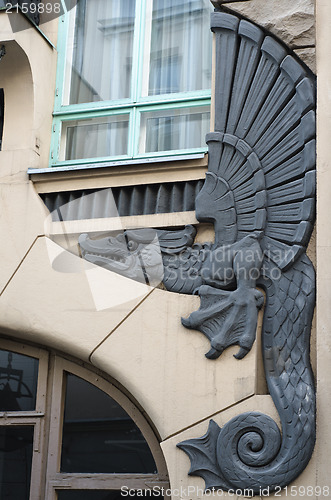 Image of Bas-relief of a dragon on a facade of an old building