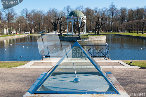 Image of Ancient sundial at a pond in park Kadriorg, Tallinn