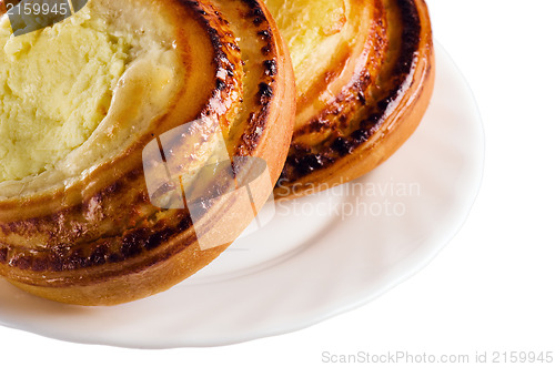 Image of fresh bake roll with a cottage cheese on plate 