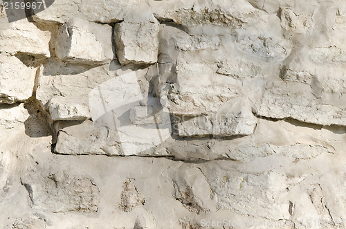 Image of Structure of an old stone wall, close up