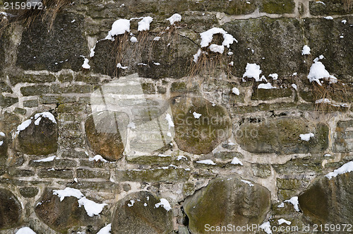 Image of Structure of an old stone wall, close up