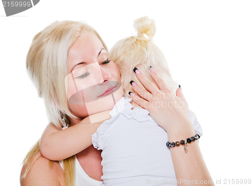 Image of Mum calms a small daughter