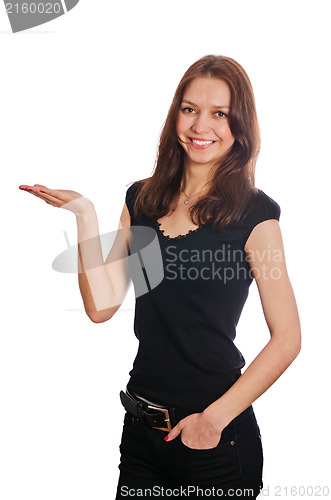Image of Portrait of pretty young woman holding her hands out and present