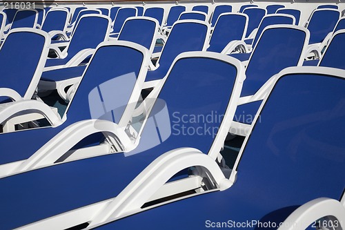 Image of empty sun loungers