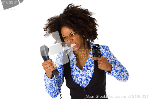 Image of Angry african american woman with handset