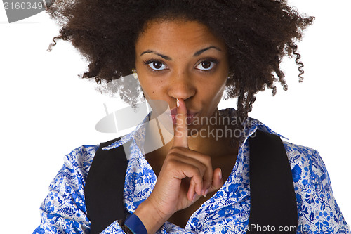 Image of Young afro american saying shhh