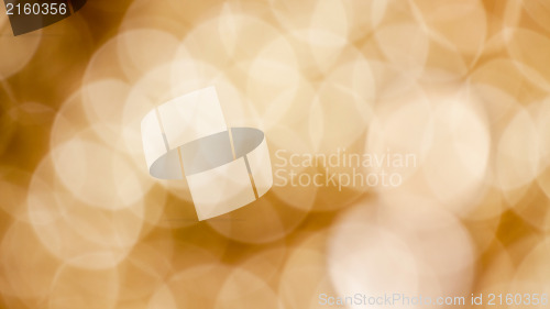 Image of Bokeh background with defocused golden lights