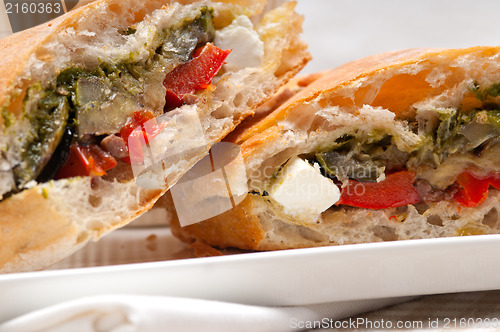 Image of ciabatta panini sandwichwith vegetable and feta