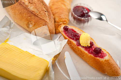 Image of bread butter and jam 