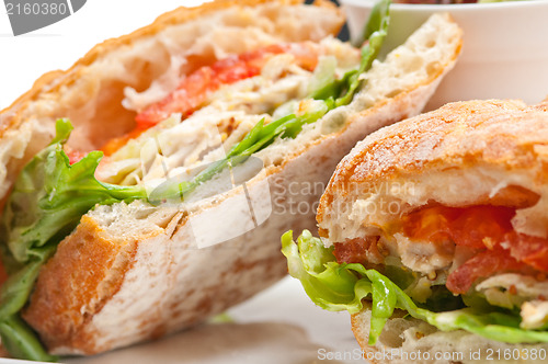 Image of ciabatta panini sandwich with chicken and tomato