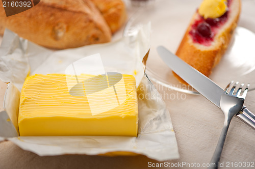 Image of bread butter and jam 