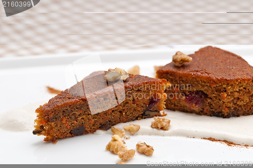 Image of fresh healthy carrots and walnuts cake dessert