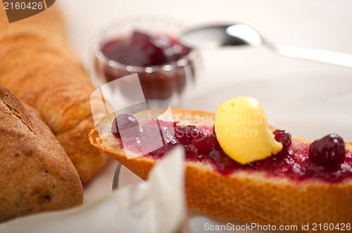Image of bread butter and jam 