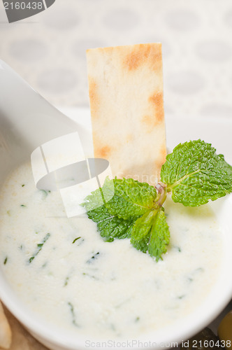 Image of Greek Tzatziki yogurt dip and pita bread