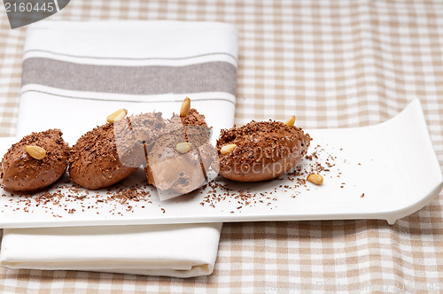 Image of chocolate mousse quenelle dessert