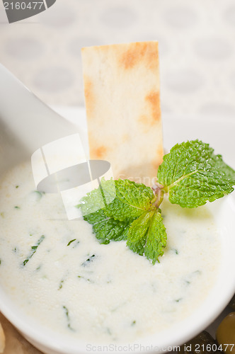 Image of Greek Tzatziki yogurt dip and pita bread