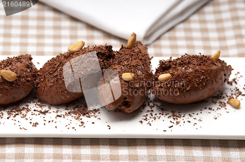Image of chocolate mousse quenelle dessert