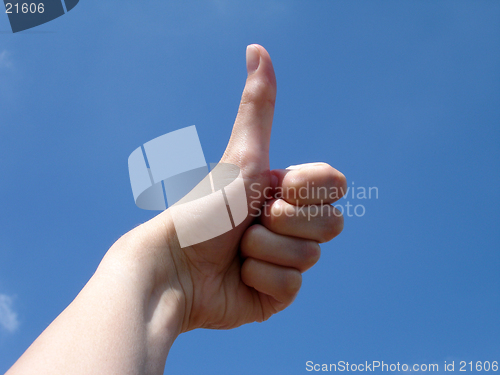 Image of Thumbs up with sky background