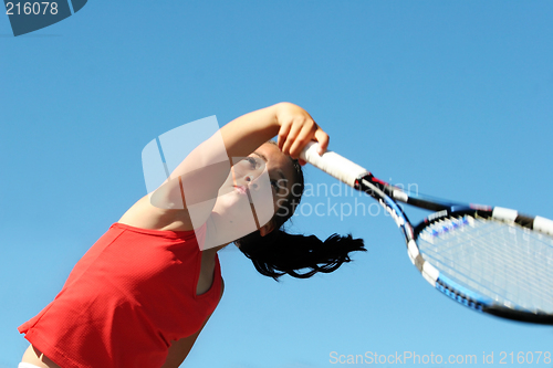 Image of Girl playing tennis