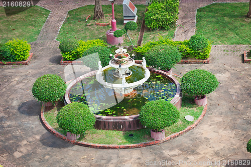 Image of Old park - fountain with lotus