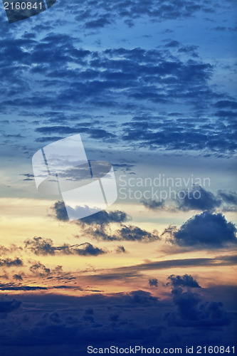 Image of Vertical Beautiful cloudy sky at sunset