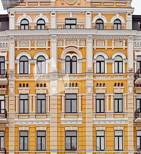 Image of Exterior of european yellow building