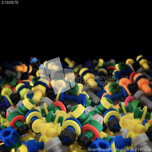 Image of Toy plastic bolts and nuts